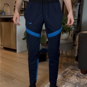 Nike Men's Dark Blue Joggers with Light Blue Accents